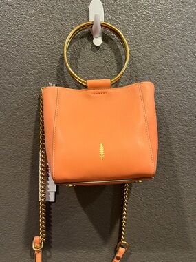 Thacker New York coral Leather Bucket Crossbody Bag with Gold Ring Handle